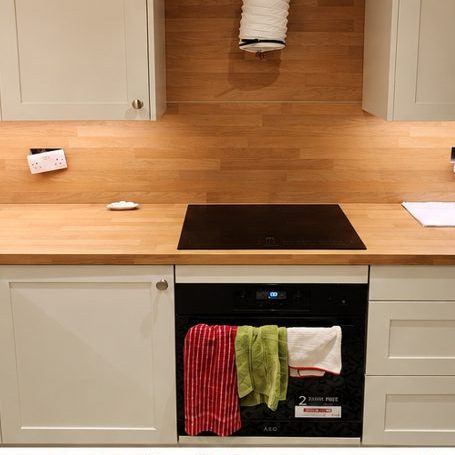 Fitted kitchen with solid wood worktops