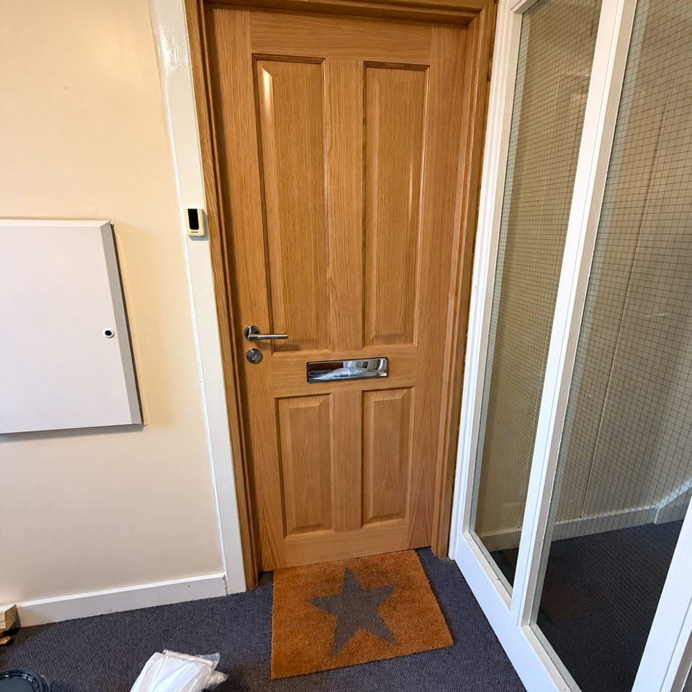 Oak-effect door fitted following a fire inspection